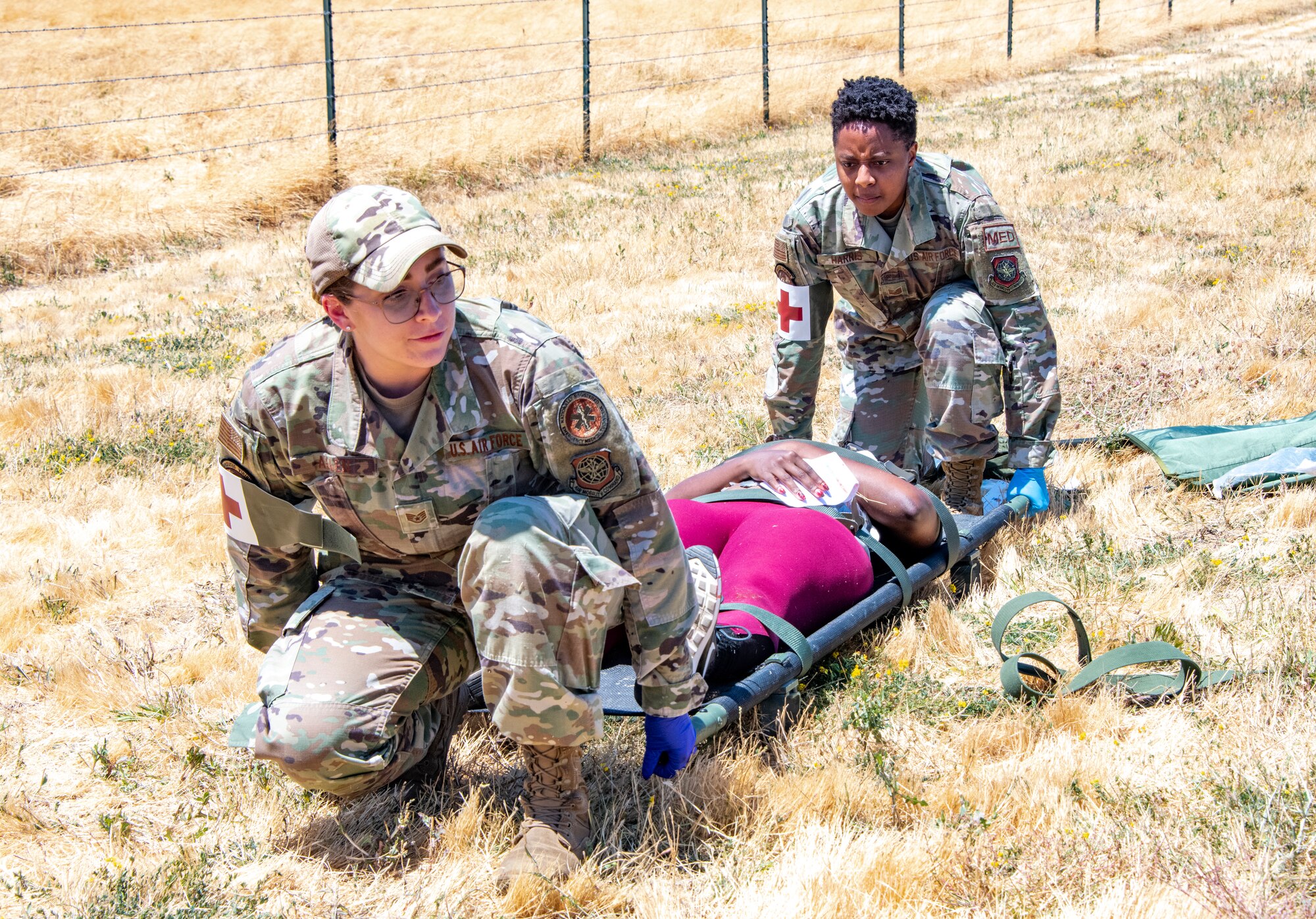 Airmen participating in a medical training exercise
