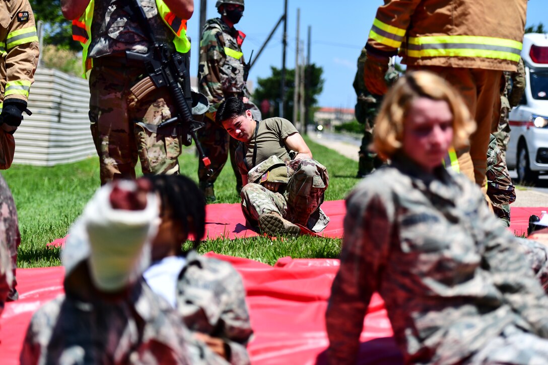 A simulated patient waits for treatment.
