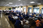 Retired Master Chief Petty Officer of the Coast Guard, Vince W. Patton III, addresses members and employees of Coast Guard Training Center Cape May during a leadership brunch held Thursday, May 28, 2015. Patton spoke about the importance of mentorship and congratulated the training center on establishing a mentorship program that helps junior members assigned to the training center. (U.S. Coast Guard Photo by Chief Warrant Officer John Edwards)