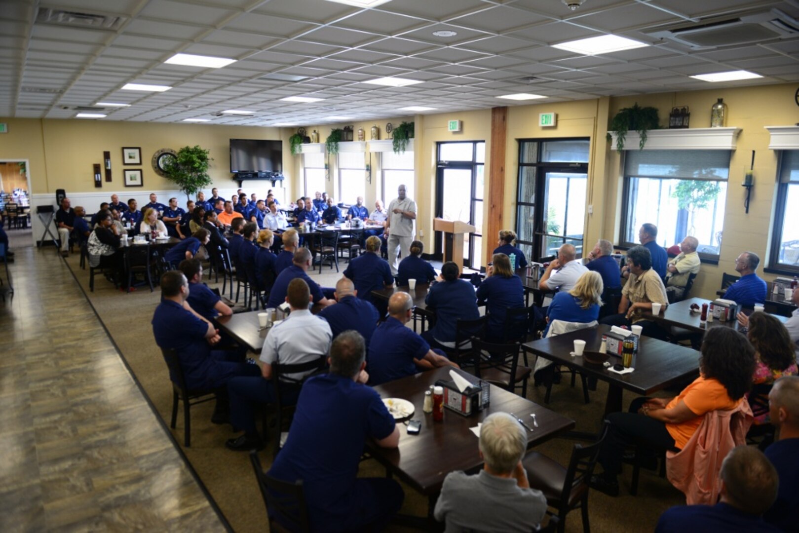 Retired Master Chief Petty Officer of the Coast Guard, Vince W. Patton III, addresses members and employees of Coast Guard Training Center Cape May during a leadership brunch held Thursday, May 28, 2015. Patton spoke about the importance of mentorship and congratulated the training center on establishing a mentorship program that helps junior members assigned to the training center. (U.S. Coast Guard Photo by Chief Warrant Officer John Edwards)