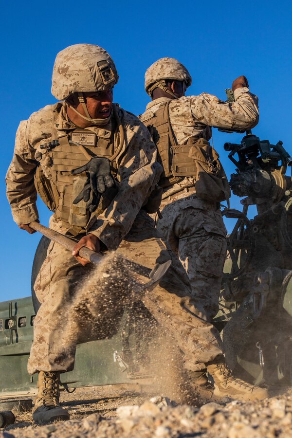 Marines with Oscar Battery, 5th Battalion, 14th Marines, 4th Marine Division, emplace an M777 Howitzer during Integrated Training Exercise (ITX) 4-21 at Marine Corps Air Ground Combat Center, Twentynine Palms, California on July 26, 2021. Reserve Marines and Sailors have come together from across the country as an integrated Marine Air-Ground Task Force to take part in a live-fire, combined arms exercise that will better prepare Marine Forces Reserve in its mission to augment and reinforce the Active Component. (U.S. Marine Corps photo by Lance Cpl. David Intriago)