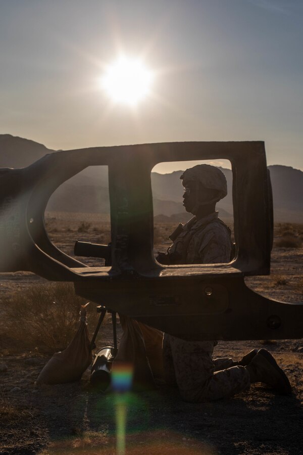 A Marine with Oscar Battery, 5th Battalion, 14th Marines, 4th Marine Division, observes howitzer barrel elevation during Integrated Training Exercise (ITX) 4-21 at Marine Corps Air Ground Combat Center Twentynine Palms, California on July 26, 2021. Reserve Marines and Sailors have come together from across the country as an integrated Marine Air-Ground Task Force to take part in a live-fire, combined arms exercise that will better prepare Marine Forces Reserve in its mission to augment and reinforce the Active Component. (U.S. Marine Corps photo by Lance Cpl. David Intriago)