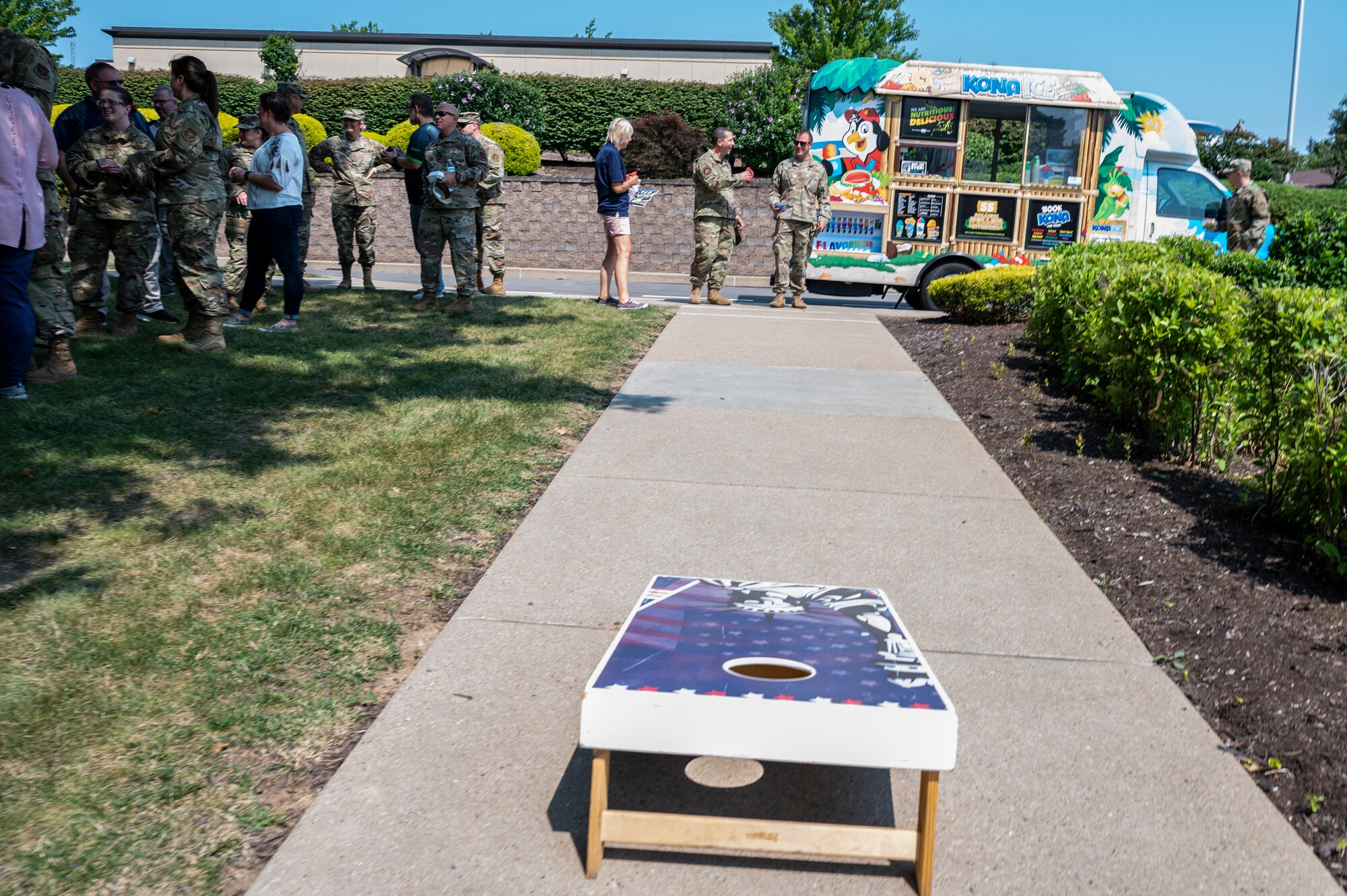 Members of the 911th Airlift Wing Stand in line to sign up for a burger burn held by the 911th Force Support Squadron at the Pittsburgh International Airport Air Reserve Station, Pennsylvania, July 27, 2021. The 911th FSS held the burger burn to thank Air Force Club members while trying to increase membership.