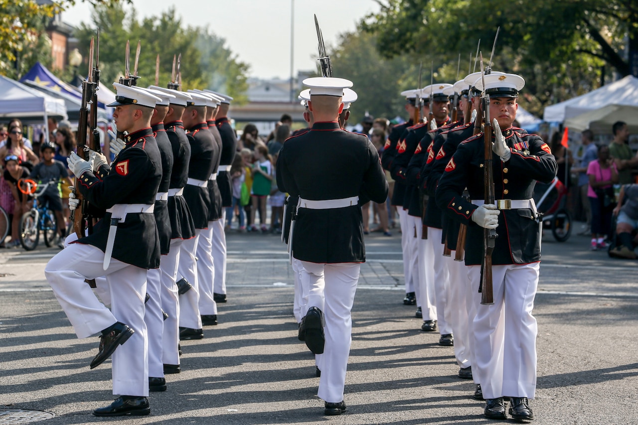 Members of the Marine Corps Silent Drill Platoon perform during a festival.