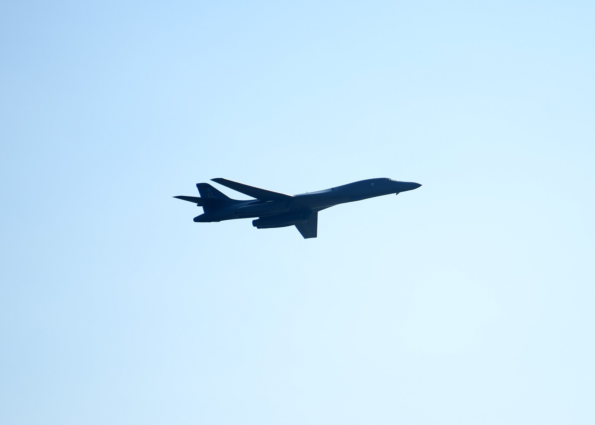 A B-1B Stratofortress flies over the Wings over Warren air show July 28, 2021 on F.E. Warren Air Force Base, Wyoming. Wings over Warren is an annual air show scheduled in conjuction with Cheyenne Frontier Days. (U. S. Air Force photo by Airman 1st Class Darius Frazier)