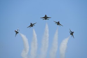 The Thunderbirds perform a bomb burst aerial demonstration over F.E. Warren Air Force Base July 26, 2021. Practice was held in anticipation of Wings Over Warren, July 28, 2021 Wings over Warren is an annual air show scheduled in conjunction with Cheyenne Frontier Days. . (U.S. Air Force photo by Airman 1st Class Charles Munoz)