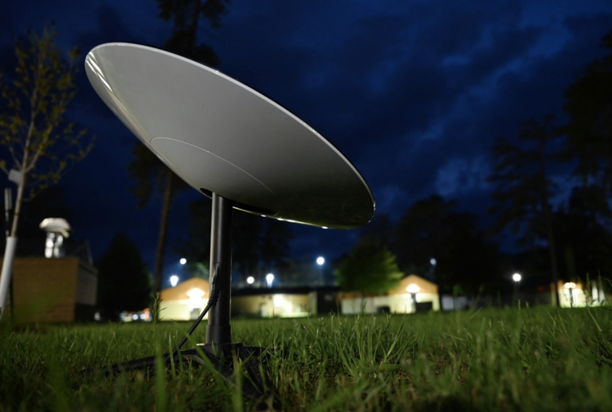 A Starlink antenna operates during the Global Information Dominance Experiment 3 and Architecture Demonstration and Evaluation 5 at Alpena Combat Readiness Training Center, Alpena, Mich., July 15, 2021. The North American Aerospace Defense Command and U.S. Northern Command in partnership with all 11 combatant commands, led the third in a series of Global Information Dominance Experiments designed to rapidly develop the capabilities required to increase deterrence options in competition and crisis through a data-centric, software-based approach. GIDE events combine people and technology to innovate and accelerate system development for domain awareness, information dominance, decisional superiority and global integration. The GIDE 3 experiment was executed in conjunction with the Department of the Air Force's Chief Architect Office as part of their fifth Architecture Demonstration and Evaluation event (ADE 5), and the Joint Artificial Intelligence Center. (U.S. Air Force photo by Tech. Sgt. Peter Thompson)