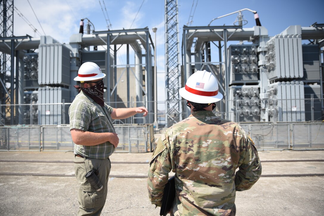 Ben Feider, Chief of Maintenance explains hydropower operations to LTC Childers at Little Goose Dam.