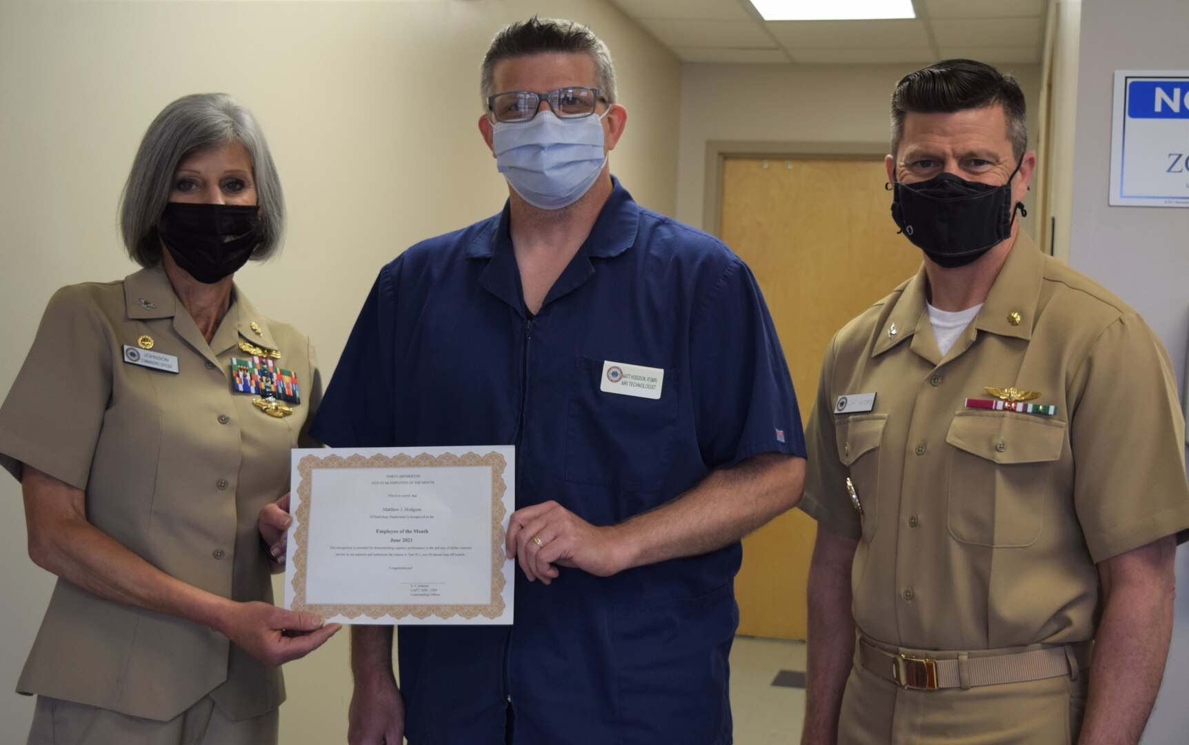 Hodgson, from Binghamton, New York and 1987 graduate from Susquehanna Valley High School, is the staff MRI (magnetic resonance imaging) technologist at Naval Hospital Bremerton (NHB) and recently announced as NHB Employee of the Month for June, 2021.