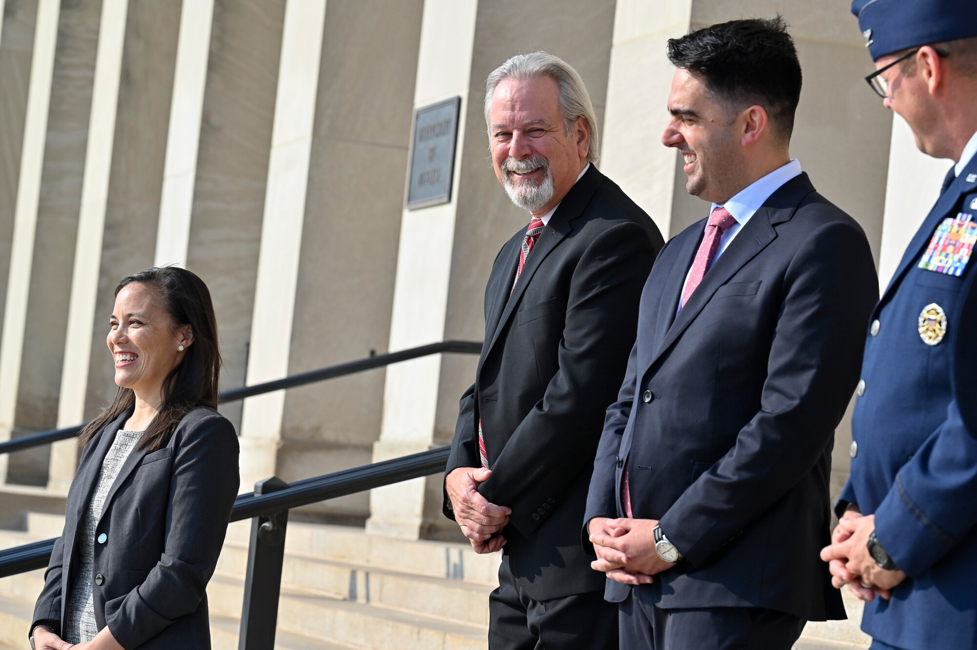 Under Secretary of the Air Force Gina Ortiz Jones, Anthony Reardon, administrative assistant to the secretary of the Air Force, and other staff members wait for the arrival of Secretary of the Air Force Frank Kendall at the Pentagon, Arlington, Va., July 28, 2021. (U.S. Air Force photo by Eric Dietrich)