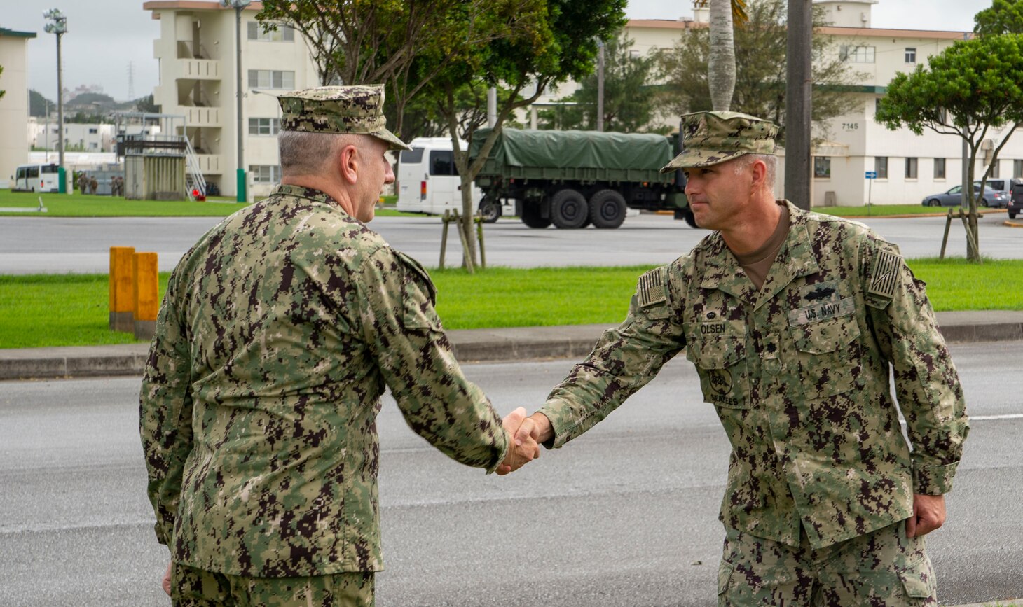 210726-N-PG340-1006 OKINAWA, Japan (July 26, 2021) Cmdr. Andrew Olsen (right), Naval Mobile Construction Battalion (NMCB) 5’s commanding officer, relieves Cmdr. Troy Brown, NMCB-4’s commanding officer, during a relief-in-place/transfer-of-authority ceremony on Camp Shields, Okinawa, Japan, July 26. NMCB-5 is the forward-deployed Indo-Pacific construction battalion. The battalion is ready to support a free and open Pacific by strengthening our network of allies and partners and providing general engineering and civil support to joint operational forces. Homeported out of Port Hueneme, California, NMCB-5 has 10 detachment sites deployed throughout the U.S. and Indo-Pacific area of operations.