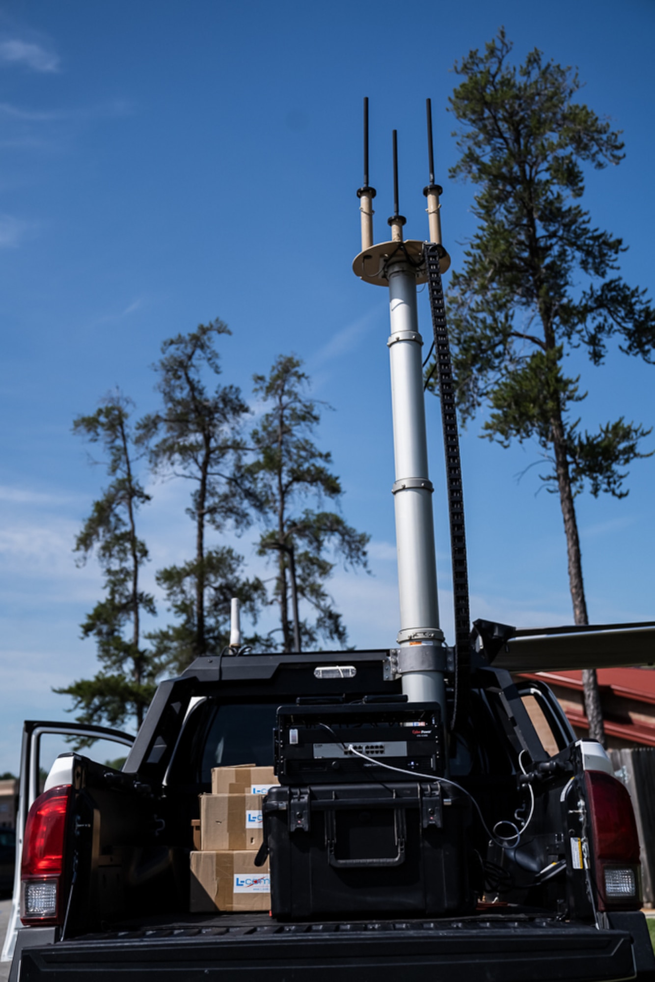 A Cell On Light Truck (COLT) broadcasts private LTE during the Global Information Dominance Experiment 3 and Architect Demonstration Evaluation 5 at Alpena Combat Readiness Training Center, Alpena, Mich., July, 12, 2021. LTE is long-term evolution and refers to wireless data transmission capabilities. North American Aerospace Defense Command and U.S. Northern Command in partnership with all 11 combatant commands, led the third in a series of Global Information Dominance Experiments designed to rapidly develop the capabilities required to increase deterrence options in competition and crisis through a data-centric, software-based approach. GIDE events combine people and technology to innovate and accelerate system development for domain awareness, information dominance, decisional superiority and global integration. The GIDE 3 experiment was executed in conjunction with the Department of the Air Force's Chief Architect Office as part of their fifth Architecture Demonstration and Evaluation event (ADE 5), and the Joint Artificial Intelligence Center. (U.S. Air Force photo by Tech. Sgt. Amy Picard)