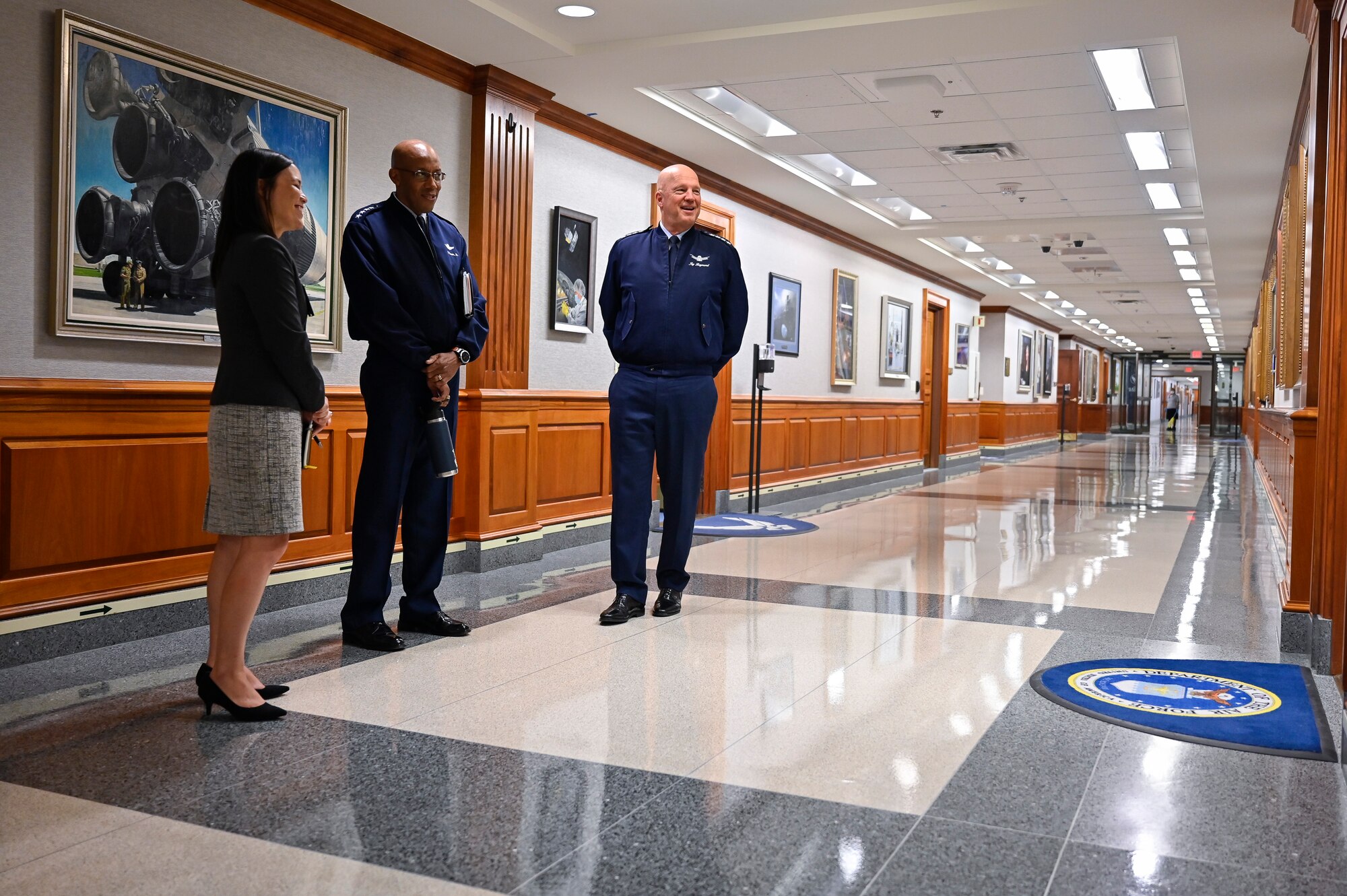 Under Secretary of the Air Force Gina Ortiz Jones, Air Force Chief of Staff Gen. CQ Brown, Jr., and Chief of Space Operations Gen. John W. “Jay” Raymond talk prior to a meeting with Secretary of the Air Force Frank Kendall at the Pentagon, Arlington, Va., July 28, 2021. (U.S. Air Force photo by Eric Dietrich)