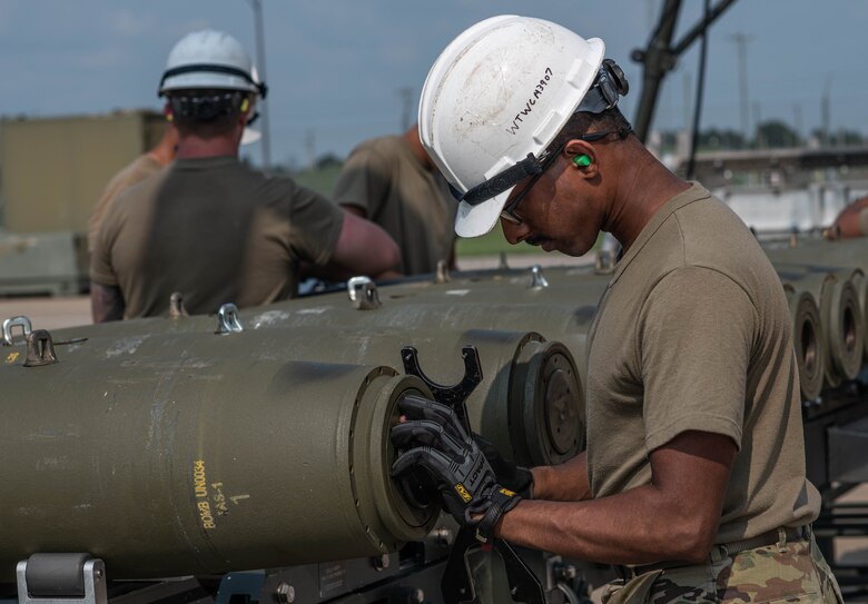 U.S. Air Force Airman 1st Class, Sooraj Thaivalappil, 509th Munitions Squadron conventional maintenance crew chief, prepares the tail end of a Guided Bomb Unit (GBU-38) assembly during exercise Quick Fuze at Whiteman Air Force Base, Missouri, July 20, 2021. Exercise Quick Fuze evaluates the squadron's ability to rapidly produce munitions. Quick Fuze is a routine exercise used to prepare contingency weapons for the B-2 Spirit and maintain operational readiness to effectively support the stealth bomber.