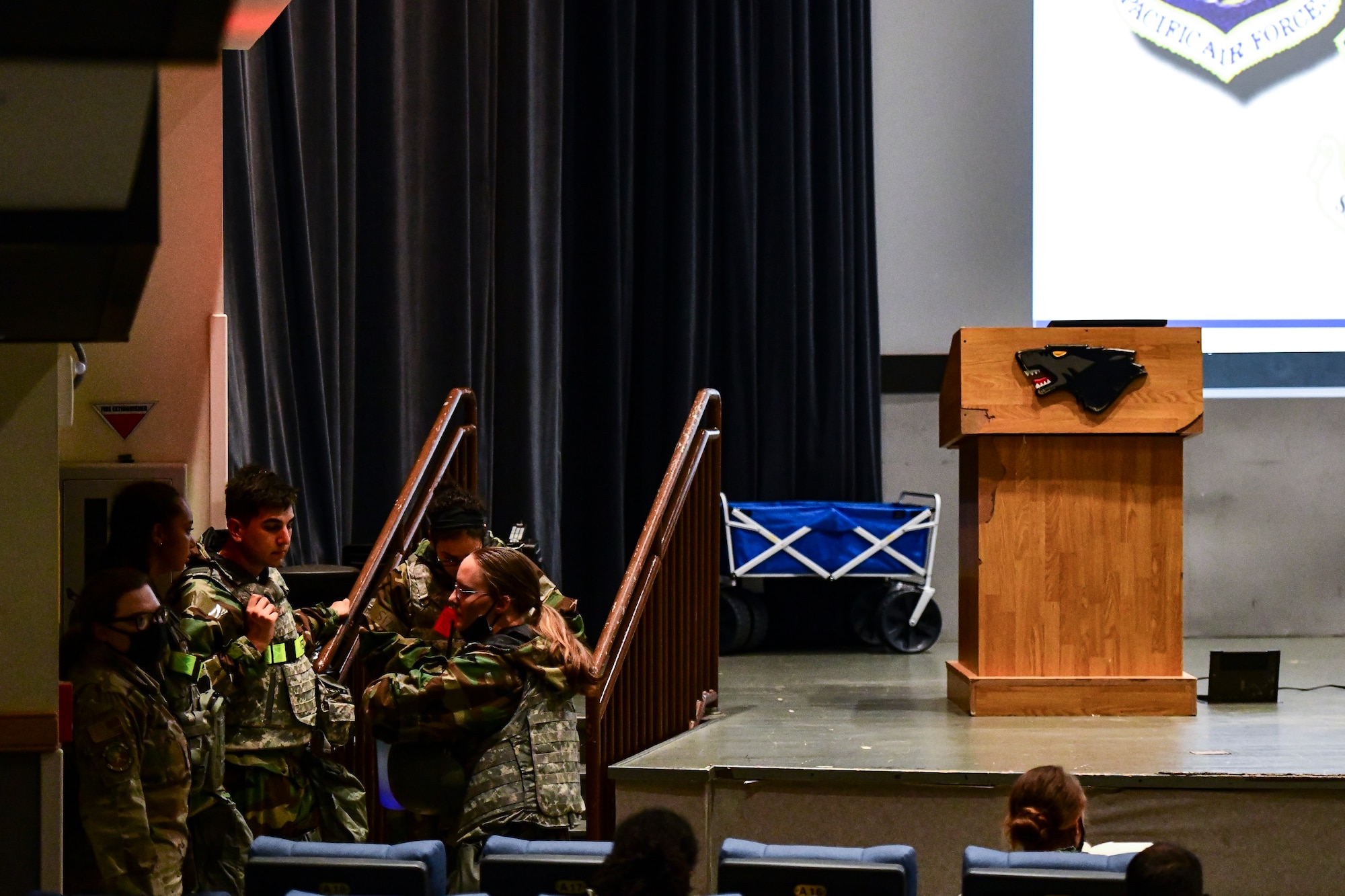 Airmen attend a briefing.