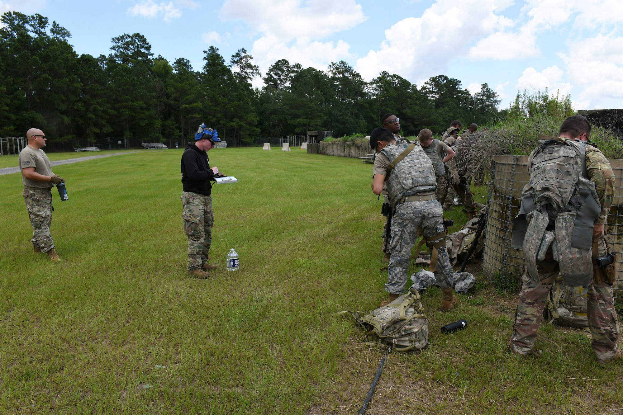 Military members putting on equipment