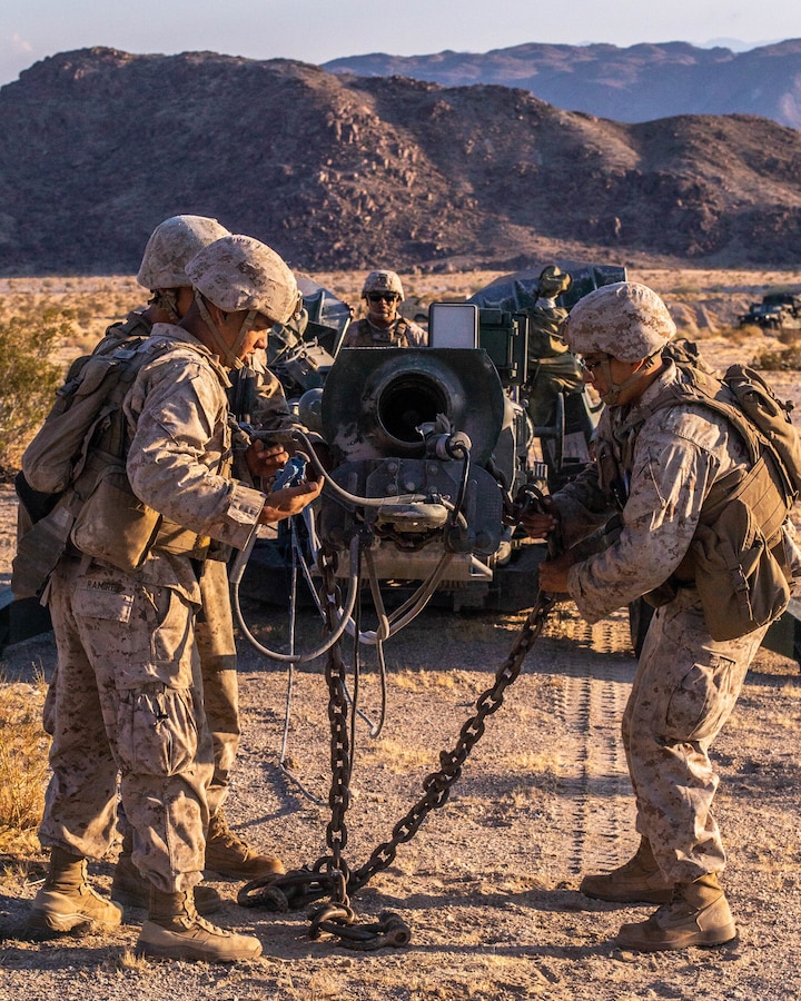 Marines with Oscar Battery, 5th Battalion, 14th Marines, 4th Marine Division, hastily deploy an M777 Howitzer during Integrated Training Exercise (ITX) 4-21 at Marine Corps Air Ground Combat Center Twentynine Palms, California on July 26, 2021. Reserve Marines and Sailors have come together from across the country as an integrated Marine Air-Ground Task Force to take part in a live-fire, combined arms exercise that will better prepare Marine Forces Reserve in its mission to augment and reinforce the Active Component. (U.S. Marine Corps photo by Lance Cpl. David Intriago)