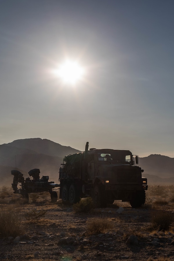 Marines with Oscar Battery, 5th Battalion, 14th Marines, 4th Marine Division, maneuver an M777 Howitzer during Integrated Training Exercise (ITX) 4-21 at Marine Corps Air Ground Combat Center, Twentynine Palms, California on July 26, 2021. Reserve Marines and Sailors have come together from across the country as an integrated Marine Air-Ground Task Force to take part in a live-fire, combined arms exercise that will better prepare Marine Forces Reserve in its mission to augment and reinforce the Active Component. (U.S. Marine Corps photo by Lance Cpl. David Intriago)