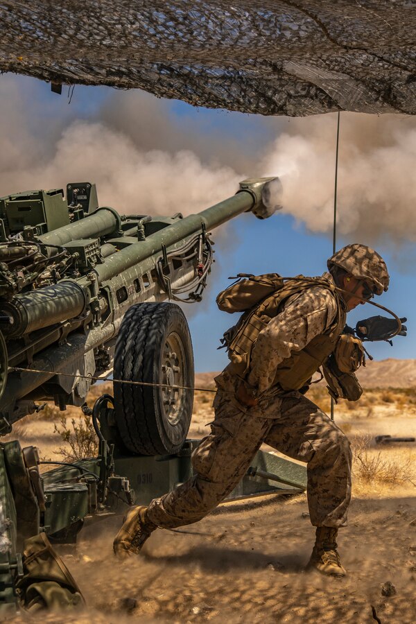 Marines with Oscar Battery, 5th Battalion, 14th Marines, 4th Marine Division, conduct fire missions in support of Battalion Distributed Operations Course (BDOC), a sub-event of Integrated Training Exercise (ITX) 4-21 at Marine Corps Air Ground Combat Center, Twentynine Palms, California on July 27, 2021. BDOC challenges a Marine Air-Ground Task Force (MAGTF) to execute offensive and defensive operations supported by air and ground assets in a geographically dispersed area of operations. MAGTF 25 is the first Reserve unit to conduct the BDOC, ensuring Marine Forces Reserve remains combat-ready. (U.S. Marine Corps photo by Lance Cpl. Samwel Tabancay)