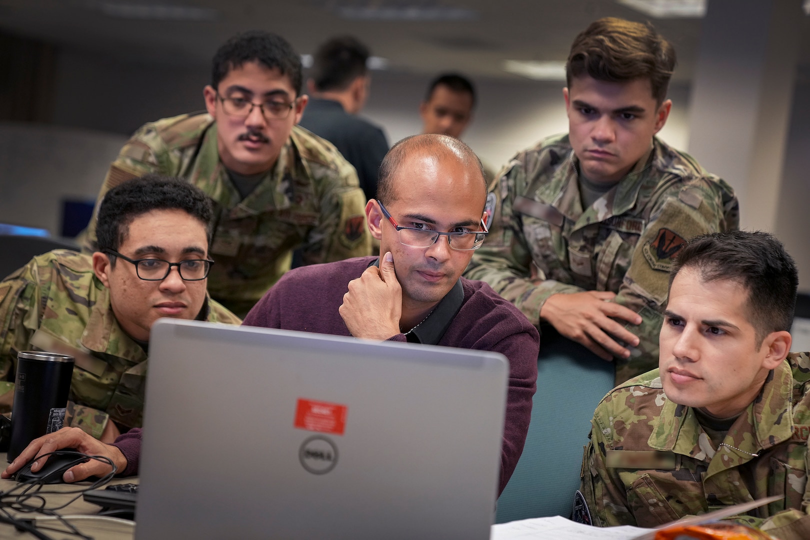 U.S. Cyber Command cyber warriors and a French cyber professional collaborate during the training exercise, Cyber Fort III, at Fort George G. Meade, Md., July 21, 2021.