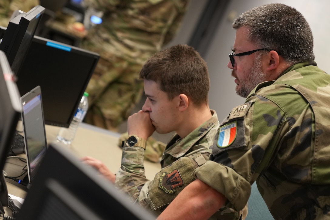 U.S. Cyber Command and French cyber warriors collaborate during the training exercise, Cyber Fort III, at Fort George G. Meade, Md., July 21, 2021