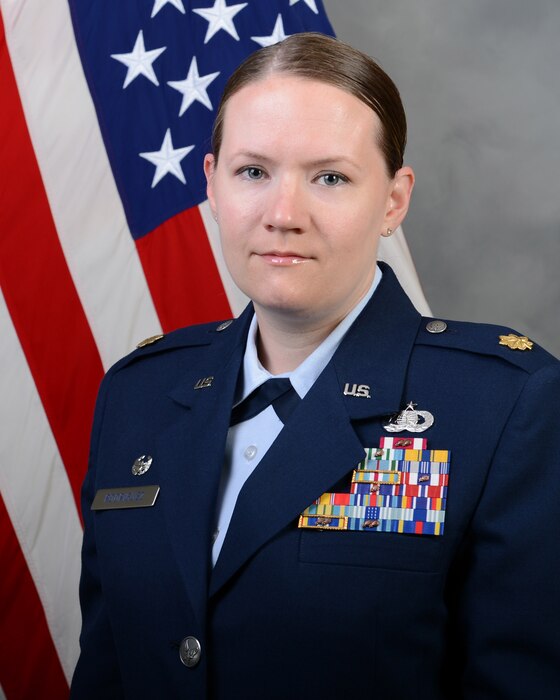 Maj. Brianna Rodriguez official photo with American flag background
