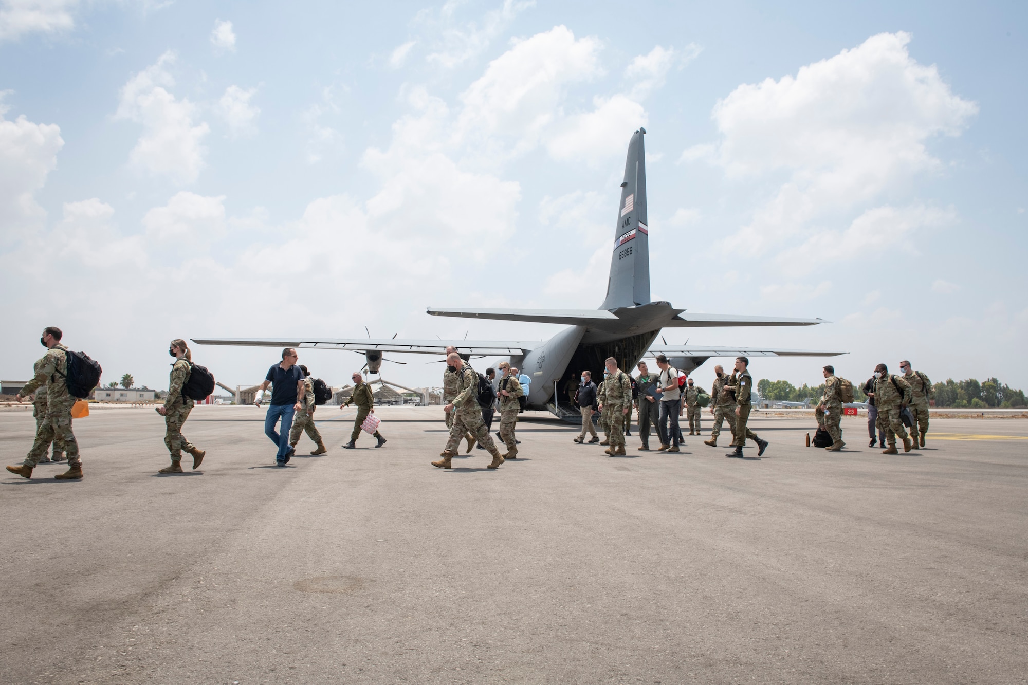 U.S. Air Force Lt. Gen. Steven Basham, U.S. Air Forces in Europe and Air Forces Africa deputy commander and Joint Task Force-Israel commander, and other U.S. Air Force members are greeted by Israel Defense Forces Col. Gershon Zlotnik, Israeli Task Force deputy commander, upon arrival in Israel to participate in Juniper Falcon 21-2, July 23, 2021. Despite the challenges presented by COVID-19, both the U.S. and Israel are focused on building readiness in support of the United States’ ironclad commitment to assist in the defense of Israel, and are committed to the safety of our personnel, their families and the communities where activities are taking place.