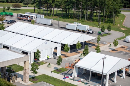 Civilian contractors building support structures for Operation Allied Refugee on 26th, July, 2021 at Fort Lee, Virginia.