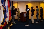 Applicants take the oath of enlistment at Chicago MEPS July 14.