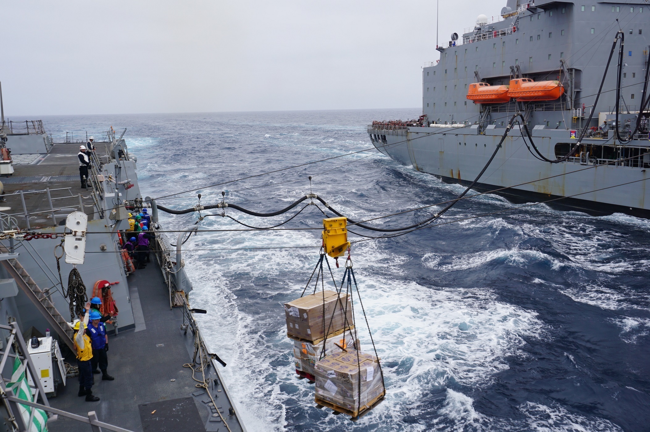 The Arleigh Burke-class destroyer USS Michael Murphy (DDG 112) conducts a replenishment-at-sea with Fleet Replenishment Oiler USNS Henry J. Kaiser (T-AO 187), July 22, 2021.