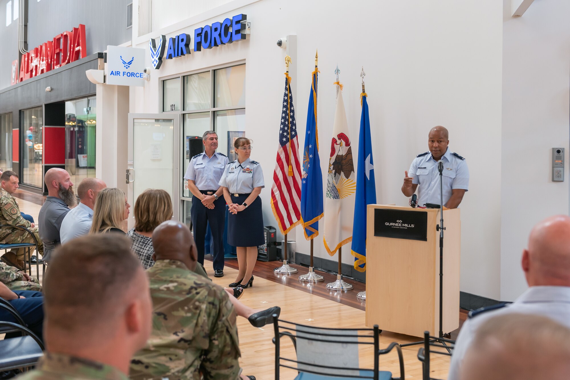 Airman speaking at ceremony.