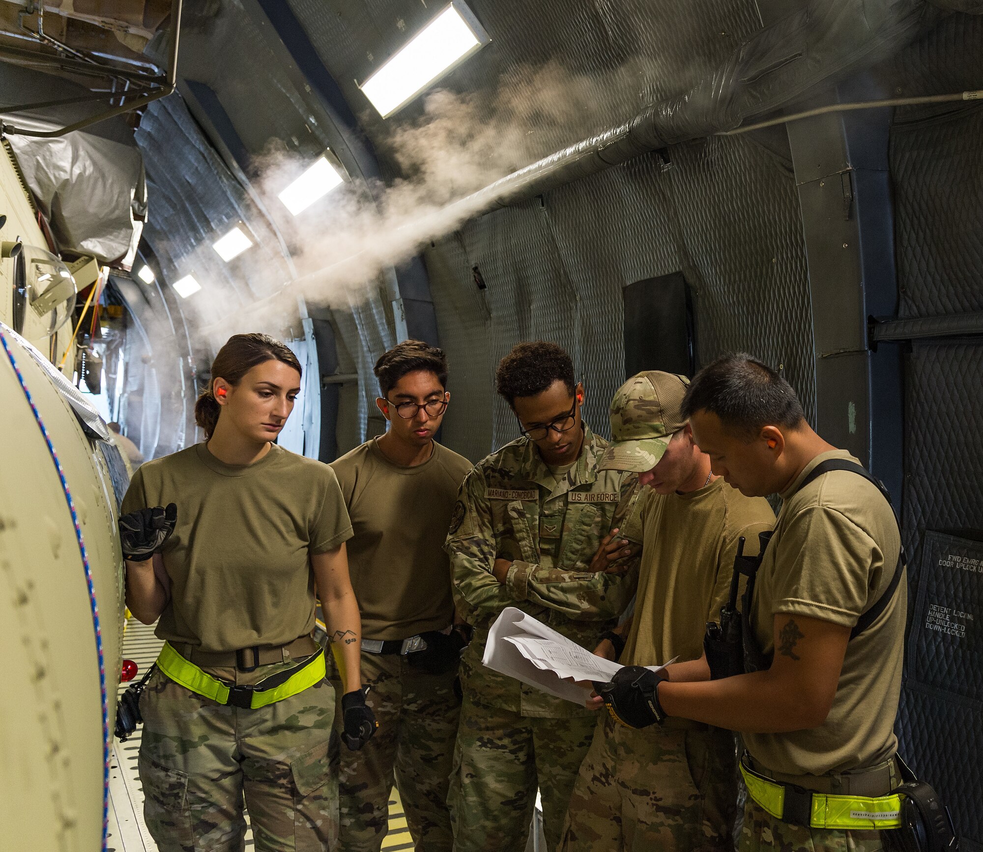 Ramp services personnel from the 436th Aerial Port Squadron review a C-5 M Super Galaxy load plan at Dover Air Force Base, Delaware, June 26, 2021. Team Dover personnel uploaded two CH-47F Chinooks onto the aircraft as part of the U.S. government’s foreign military sales program. The U.S.-Australia alliance is an anchor for peace and stability in the Indo-Pacific region and around the world. (U.S. Air Force photo by Roland Balik)