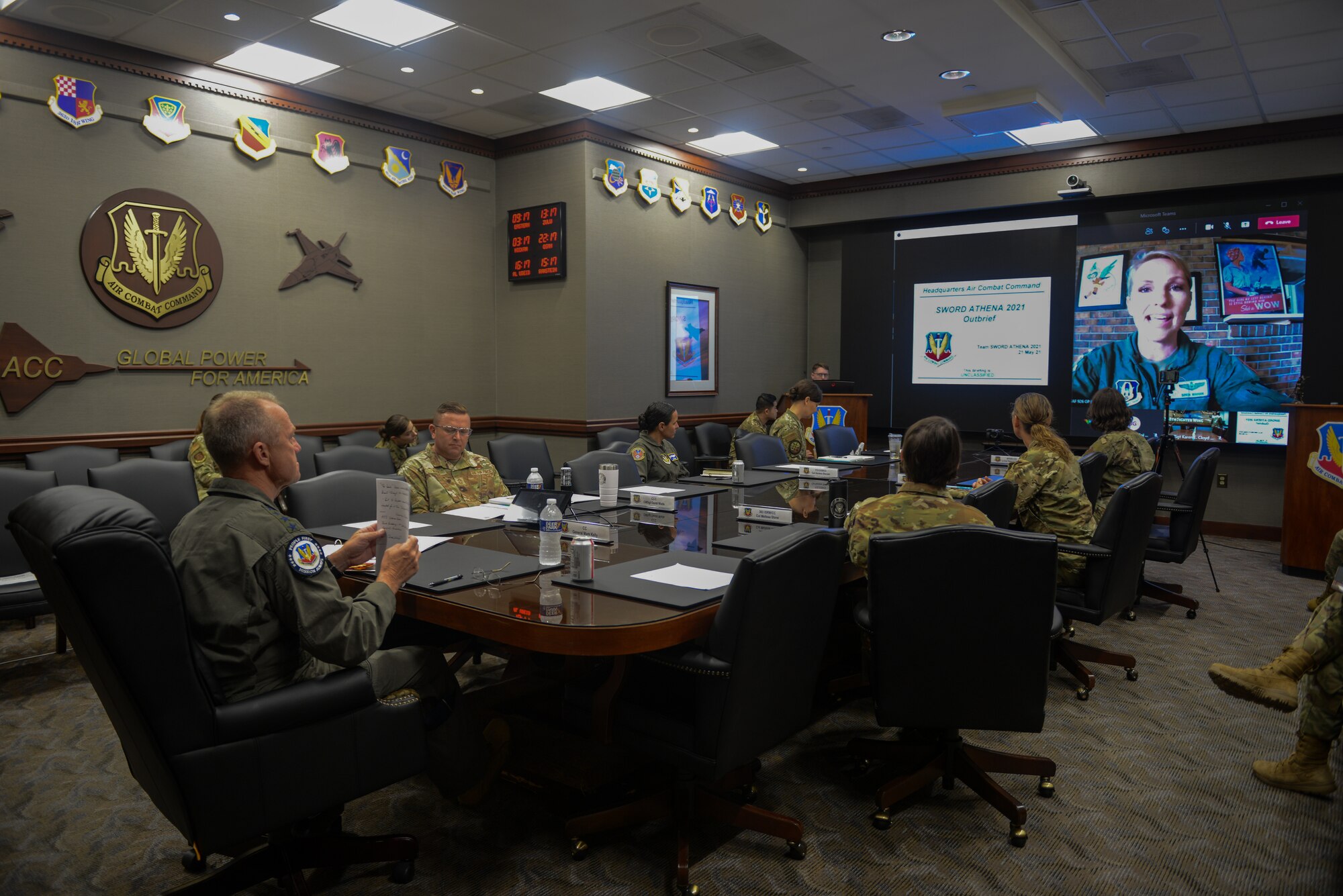 U.S. Air Force Gen. Mark Kelly, commander of Air Combat Command, listens to the out-brief of the second annual Sword Athena 2021.