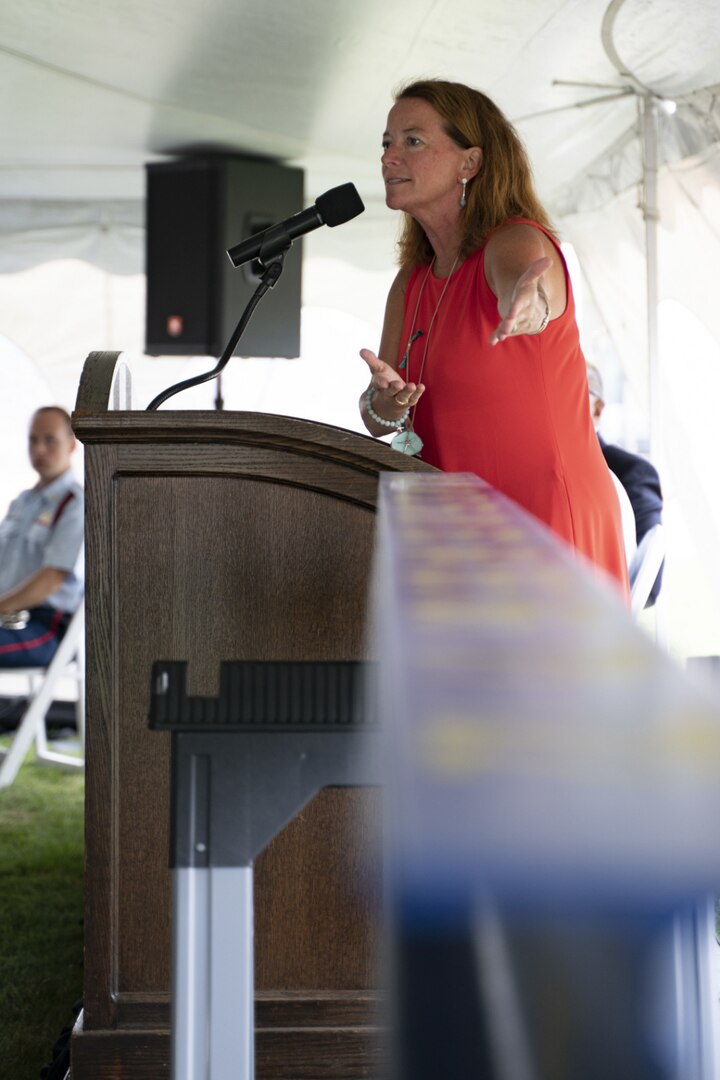 In a twist on the traditional groundbreaking ceremony, U.S. Coast Guard leaders signed a ceremonial steel beam which will be used in the construction of the future Maritime Center of Excellence (MCOE) at the U.S. Coast Guard Academy, July 29, 2021. The future MCOE will enhance the waterfront facilities at the Academy by offering interactive and high-tech classrooms for a variety of educational and leadership development courses. (U.S. Coast Guard photo by Petty Officer 3rd Class Matthew Thieme)