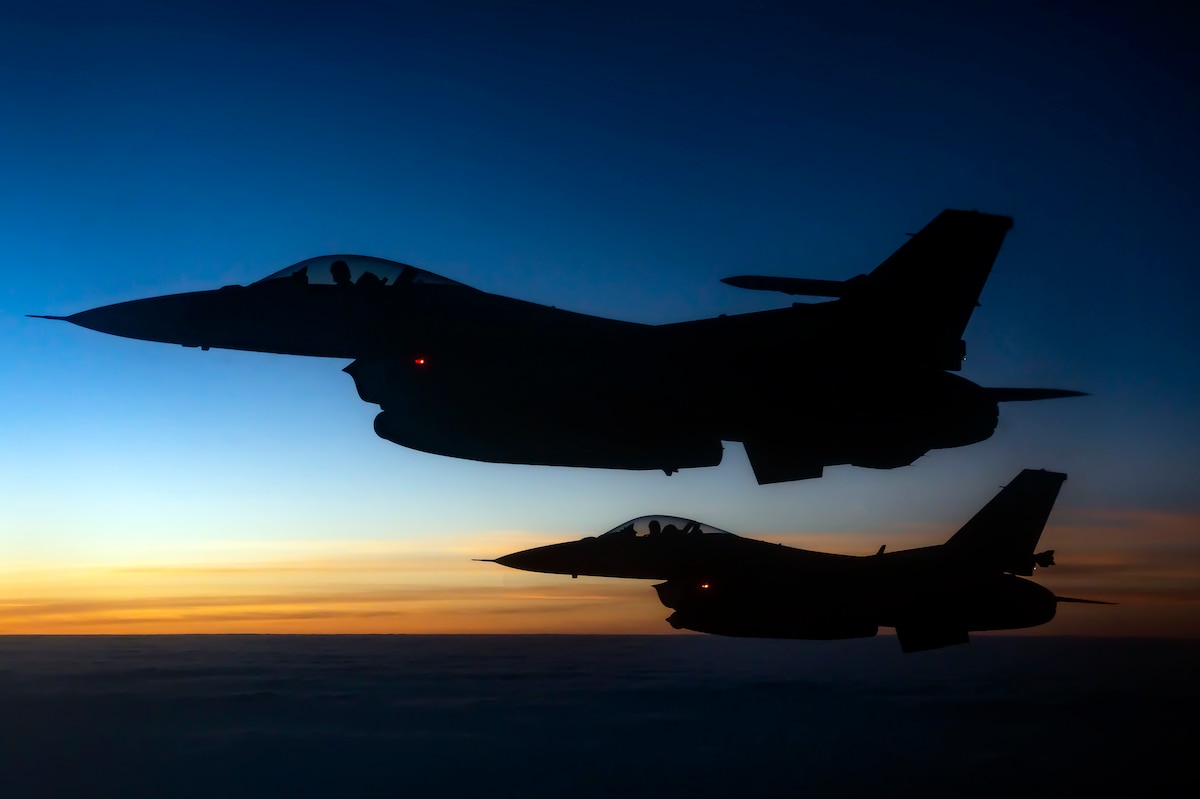 Two U.S. Air Force F-16 Fighting Flacon Aircraft fly Through The Sky