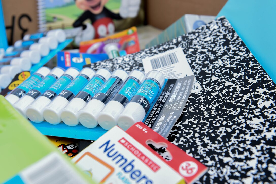 The 23rd Force Support Squadron’s Airman and Family Readiness Center collected school supplies from six local dollar-stores to distribute to Airmen during an event supporting Operation Homefront at Moody Air Force Base, Georgia, July 26, 2021. Volunteers spent four hours separating and distributing the school supplies to members E-6 and below. (U.S. Air Force photo by Senior Airman Rebeckah Medeiros)