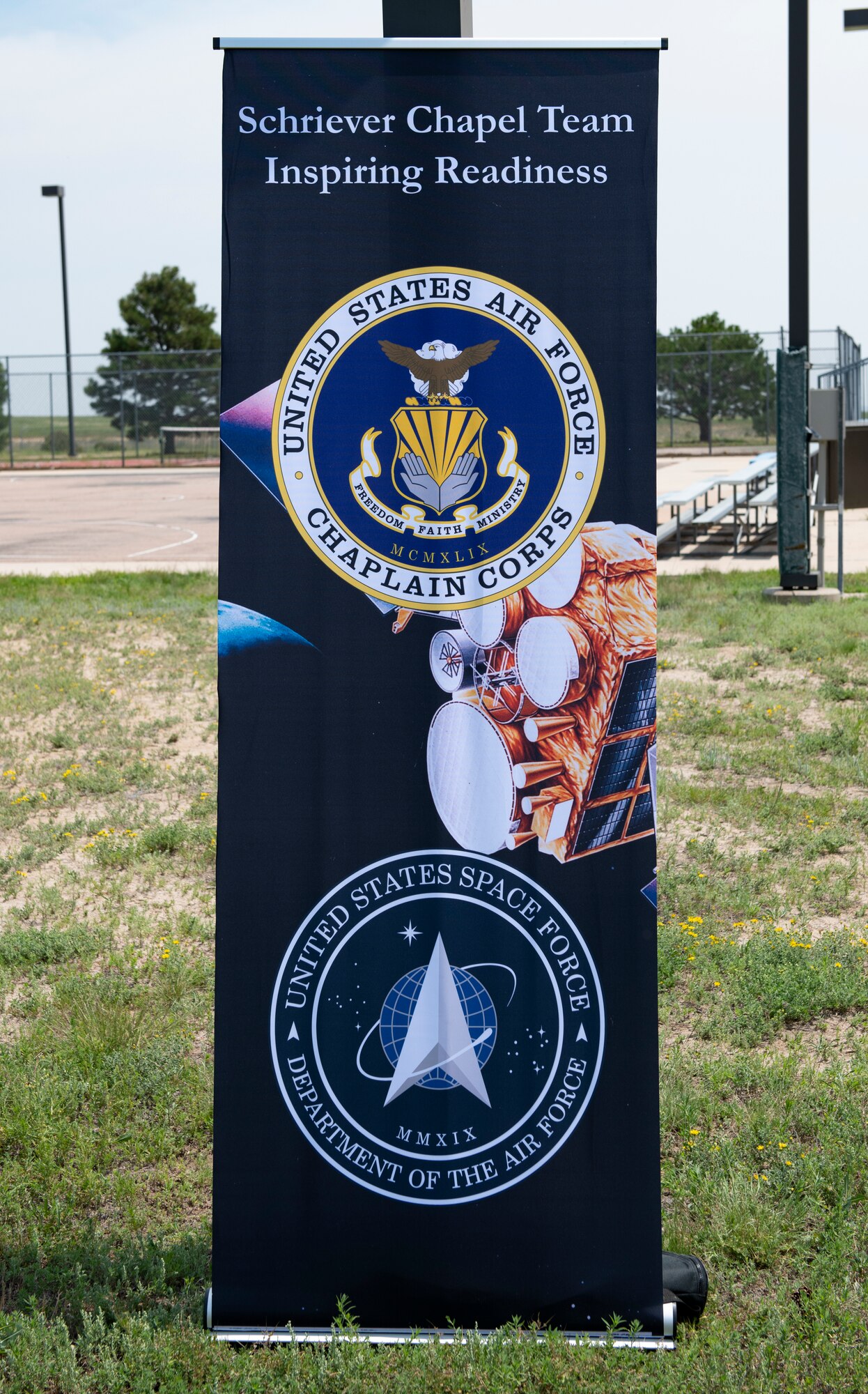 Sign sitting in front of pole