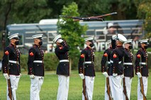 Marines with the Silent Drill Platoon execute their “rifle inspection” sequence during the Non-Commissioned Officer Tuesday Sunset Parade at the Marine Corps War Memorial, Arlington, Va., July 27, 2021.