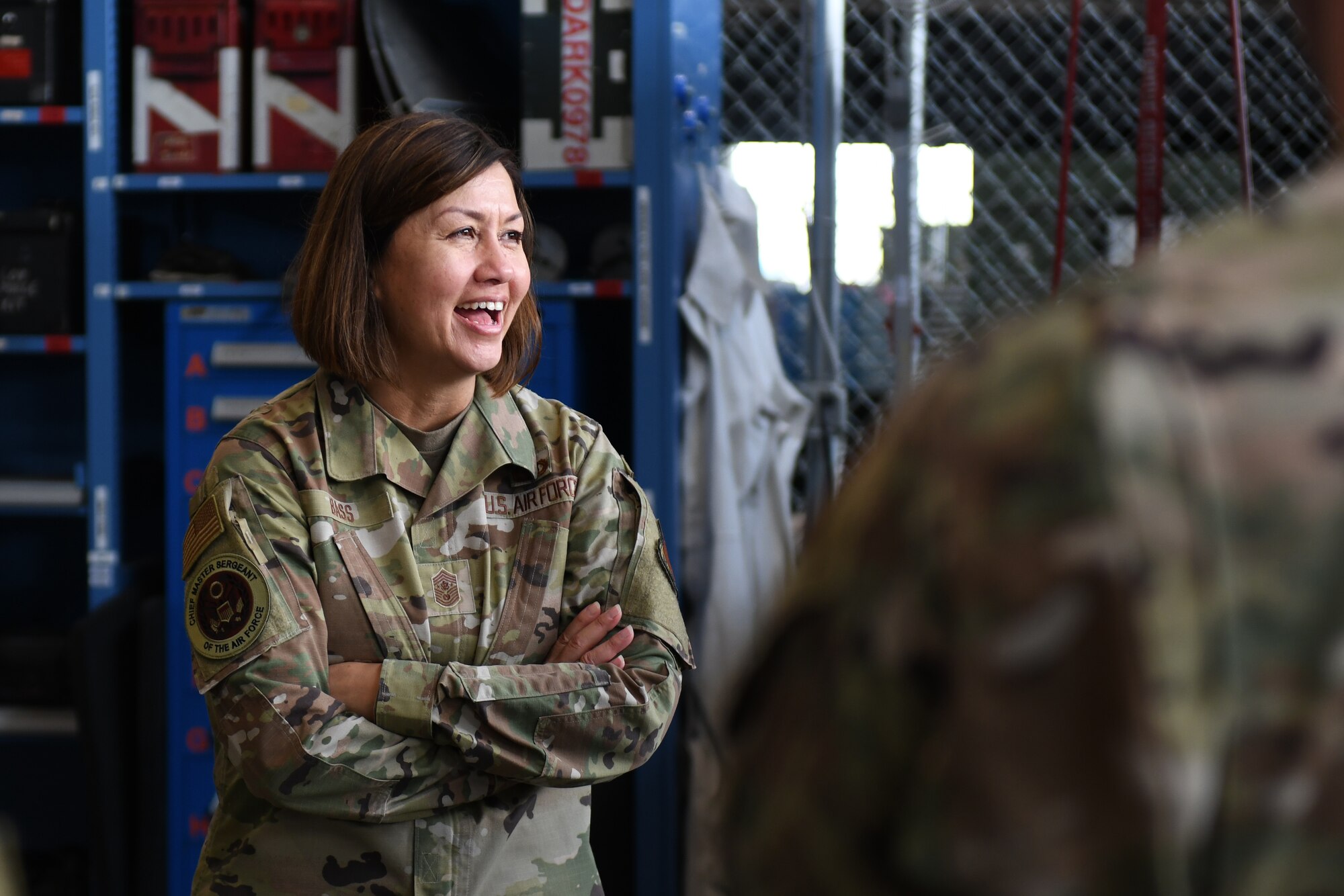 Chief Master Sergeant of the Air Force JoAnne S. Bass laughs