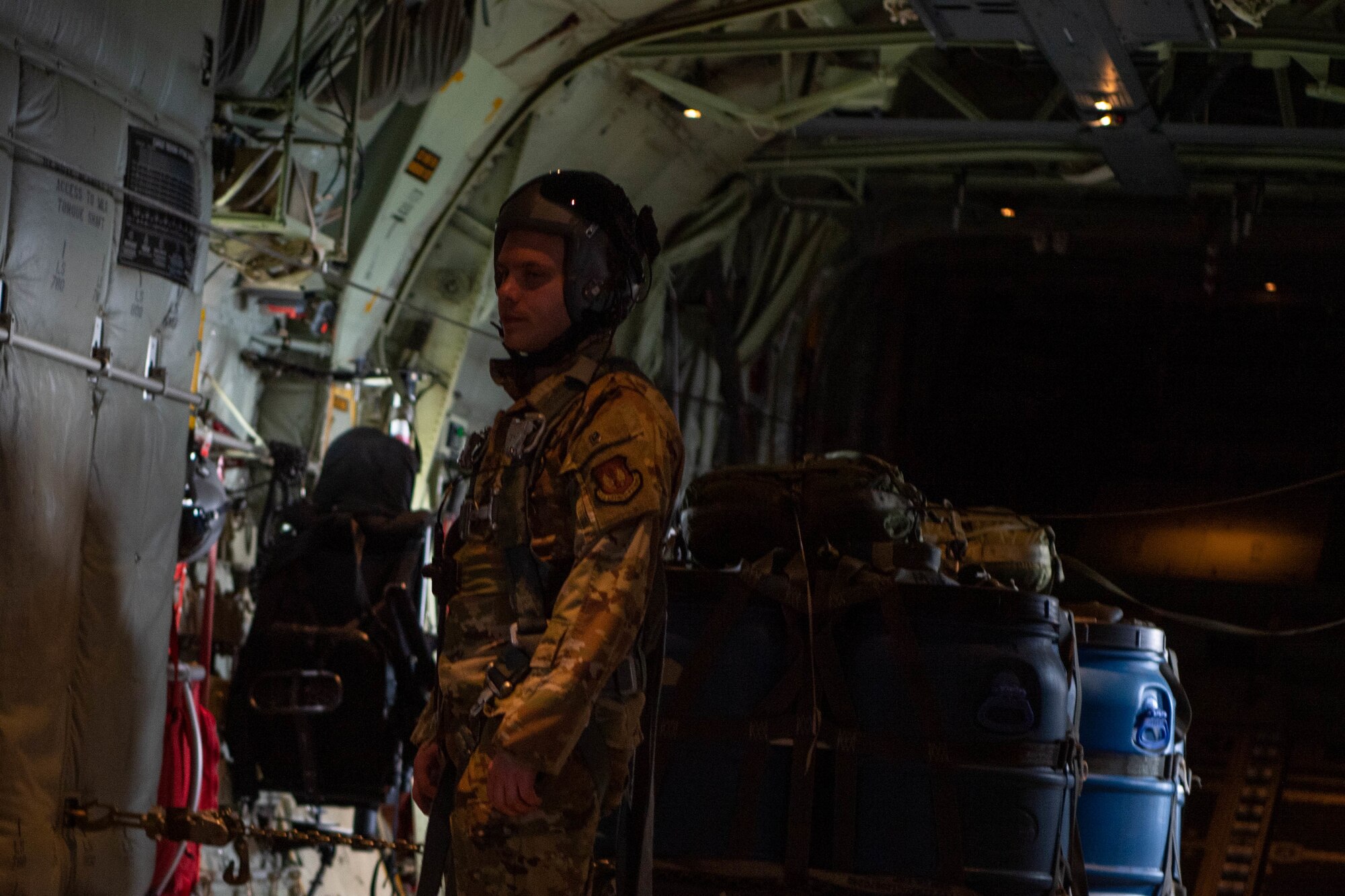 Airman stands near a load