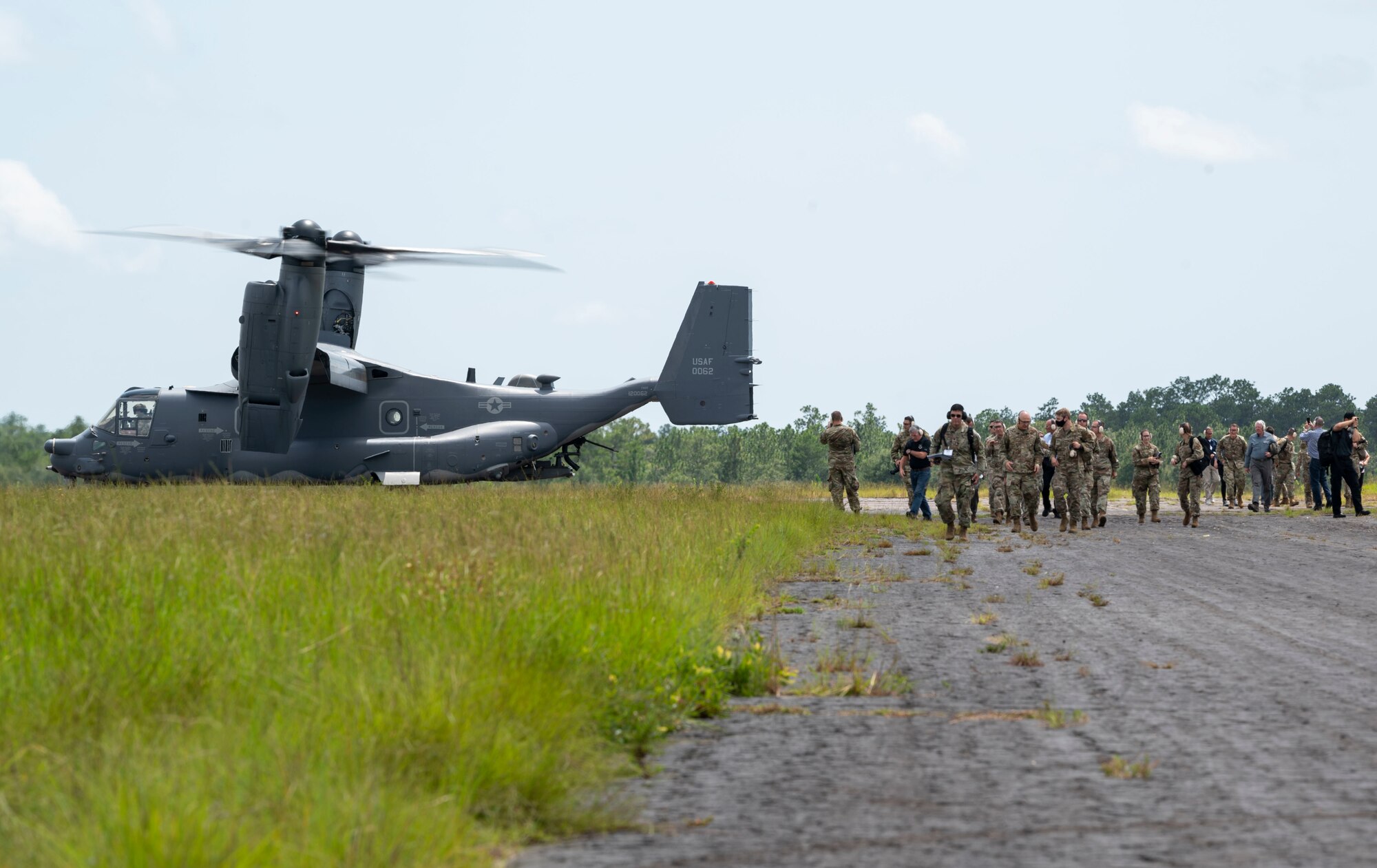 U.S. Air Force Gen. Arnold Bunch, commander of Air Force Material Command, U.S. Air Force Lt. Gen. Jim Slife, commander of Air Force Special Operations Command, and other AFMC and AFSOC senior leaders, disembark from a CV-22 Osprey at Austere Field #6, Florida, July 21, 2021.