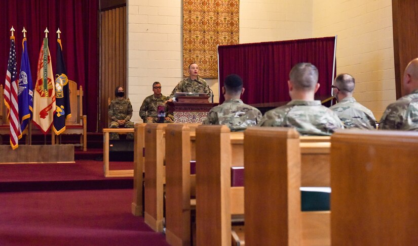 Soldiers and Airmen attend an Army Chaplain Corps birthday ceremony at Joint Base McGuire-Dix-Lakehurst, N.J., July 29, 2021. The ceremony involved a history of the Chaplain Corps, singing of the Army Chaplain Song and a traditional cake cutting.