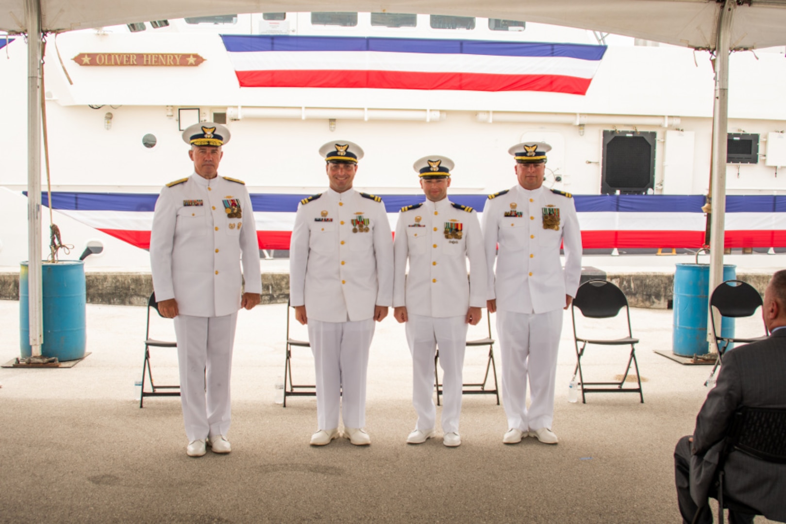 Adm. Karl Schultz, the commandant of the Coast Guard, stands with the commanding officers of three newly commissioned fast response cutters during a commissioning ceremony at Coast Guard Sector Guam July 29, 2021. During the ceremony, Coast Guard Cutters Myrtle Hazard, Oliver Henry and Fredrick Hatch were commissioned. (U.S. Coast Guard photo by Petty Officer 1st Class Travis Magee/Released)