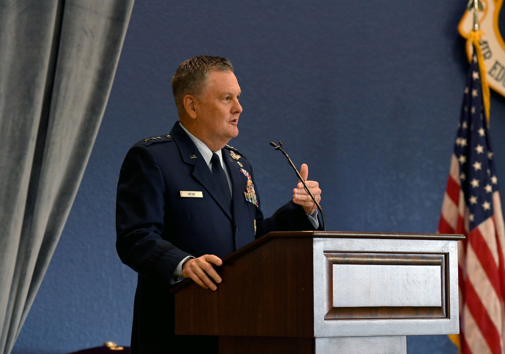 U.S. Air Force Lt. Gen. Brad Webb, commander of Air Education and Training Command, delivers remarks during the Second Air Force change of command ceremony inside the Bay Breeze Event Center at Keesler Air Force Base, Mississippi, July 30, 2021. The ceremony is a symbol of command being exchanged from one commander to the next. Maj. Gen. Andrea Tullos relinquished command of the Second Air Force to Maj. Gen. Michele Edmondson. (U.S. Air Force photo by Kemberly Groue)
