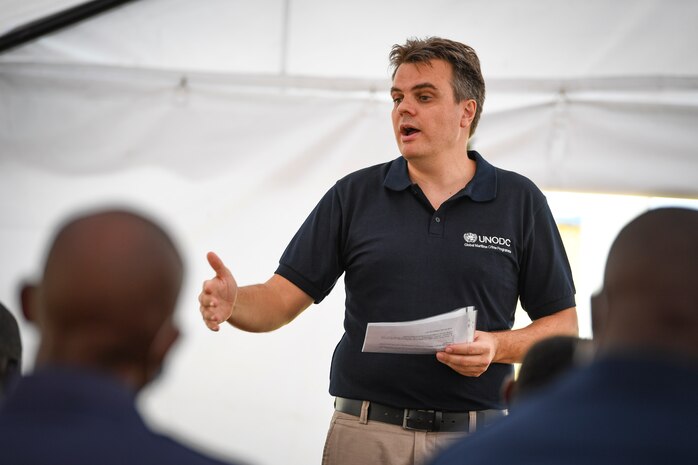 (July 30, 2021) Tiago Zanella, United Nations Office on Drugs and Crime Law of the Sea expert, discusses maritime law during exercise Cutlass Express 2021 at the Bandari Maritime Academy in Mombasa, Kenya, July 30, 2021. Cutlass Express is designed to improve regional cooperation, maritime domain awareness and information sharing practices to increase capabilities between the U.S., East African and Western Indian Ocean nations to counter illicit maritime activity.
