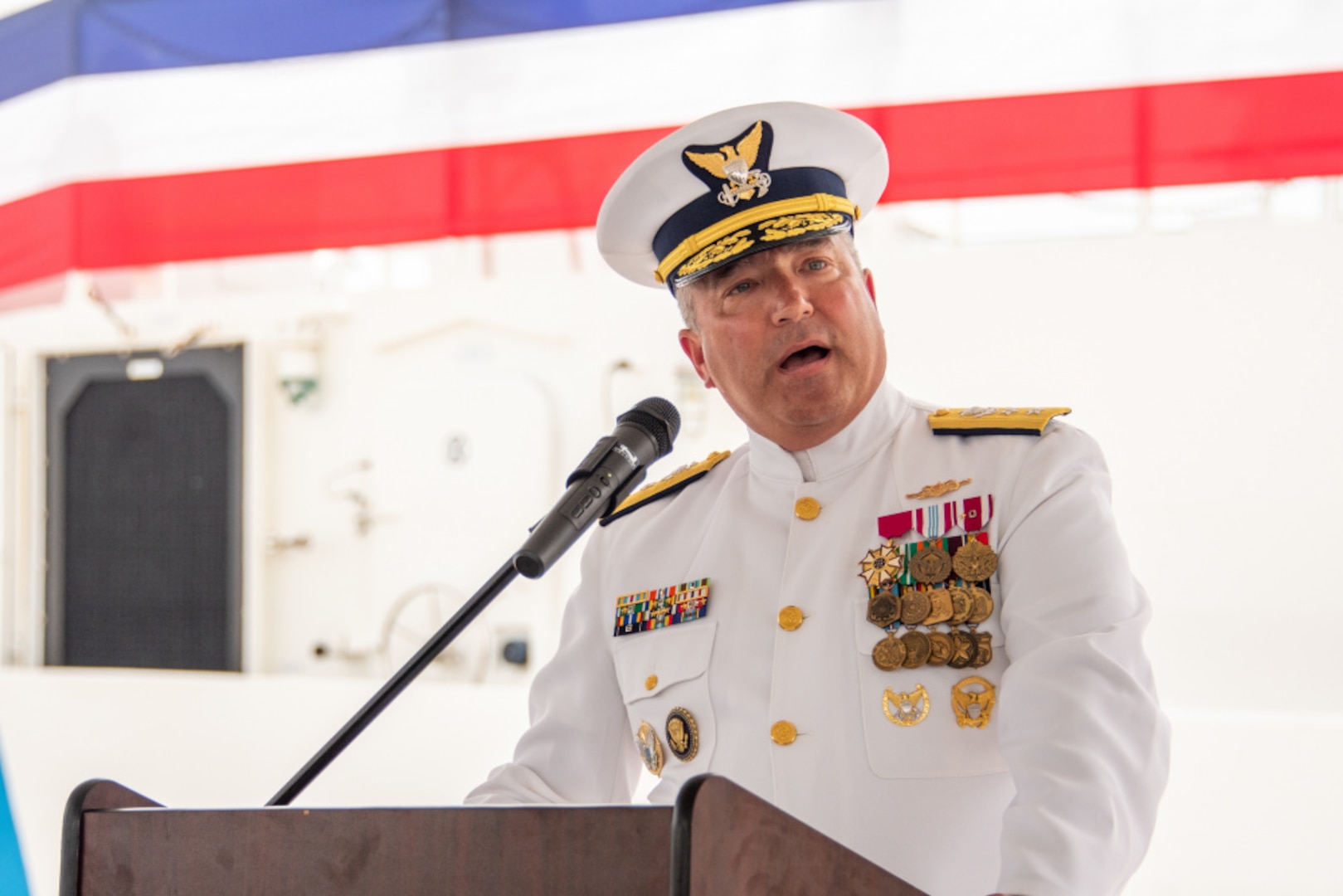 Rear Adm. Matthew W. Sibley, the Commander of the 14th Coast Guard District, speaks during a rare triple-commissioning ceremony at Coast Guard Sector Guam July 29, 2021. During the ceremony, Coast Guard Cutters Myrtle Hazard, Oliver Henry and Fredrick Hatch were commissioned. (U.S. Coast Guard photo by Petty Officer 1st Class Travis Magee/Released)
