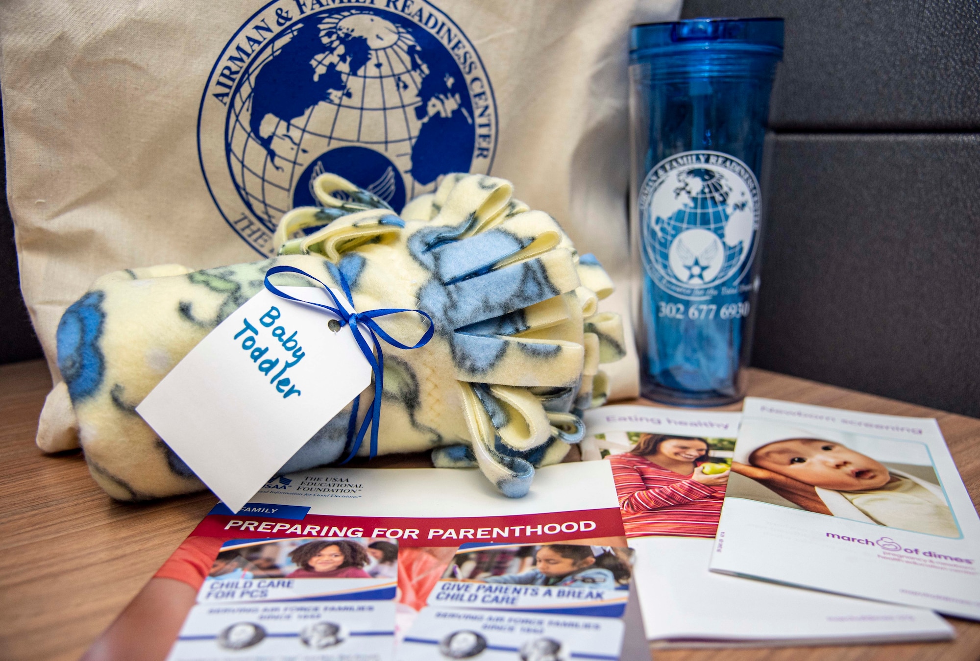 Information provided to parents at the Bundles for Babies workshop is displayed at the Airman and Family Readiness Center at Dover Air Force Base, Delaware, July 9, 2021. Bundles for Babies is a free workshop, funded by the Air Force Aid Society where parents receive information about budgeting for a baby, childcare, nutrition and  as well as briefings from subject matter experts from Family Advocacy, Exceptional Family Member Program, Military Life Consultant and the Delaware Office of Highway Safety. Following the workshop, each family receives a $50 gift card to use at the Base Exchange for baby supplies, courtesy for AFAS. (U.S. Air Force photo by Tech. Sgt. Nicole Leidholm)