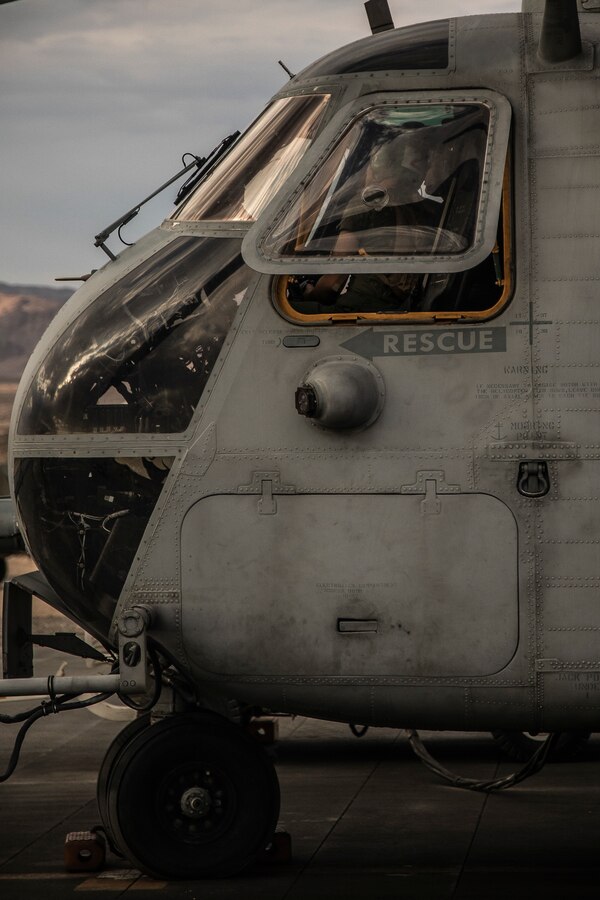 Marines with Marine Heavy Helicopter Squadron (HMH) 772 perform engine checks on a CH-53E Super Stallion helicopter during Integrated Training Exercise (ITX) 4-21 at Marine Corps Air Ground Combat Center, Twentynine Palms, California on July 28, 2021. HMH-772 is supporting Marine Air Ground Task Force 25 as part of the Aviation Combat Element during ITX, providing troop transport and heavy lift capabilities. (U.S. Marine Corps photo by Lance Cpl. Samwel Tabancay)