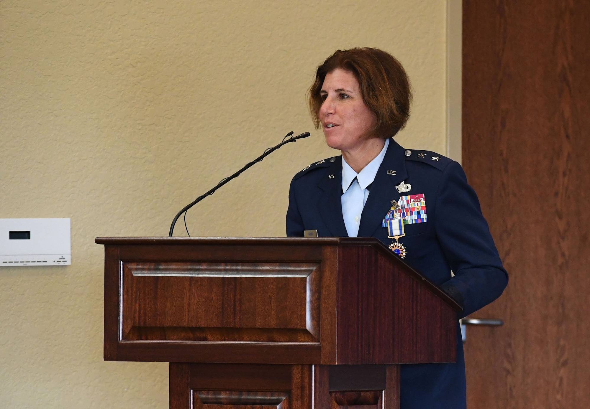 U.S. Air Force Maj. Gen. Andrea Tullos, Second Air Force commander, delivers remarks during the Second Air Force change of command ceremony inside the Bay Breeze Event Center at Keesler Air Force Base, Mississippi, July 30, 2021. The ceremony is a symbol of command being exchanged from one commander to the next. Tullos relinquished command of the Second Air Force to Maj. Gen. Michele Edmondson. (U.S. Air Force photo by Kemberly Groue)