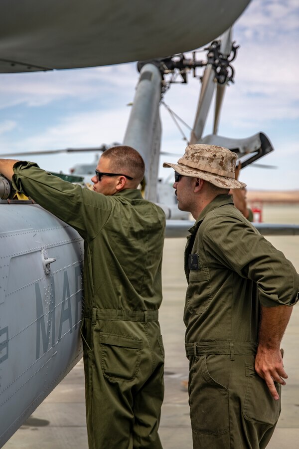 Marines with Marine Light Attack Helicopter Squadron (HMLA) 773 perform maintenance on a UH-1Y Venom helicopter during Integrated Training Exercise (ITX) 4-21 at Marine Corps Air Ground Combat Center, Twentynine Palms, California on July 28, 2021. HMLA-773 is supporting Marine Air Ground Task Force 25 as part of the Aviation Combat Element during ITX, providing close air support and deep air support to the Ground Combat Element. (U.S. Marine Corps by photo Sgt. JVonnta Taylor)